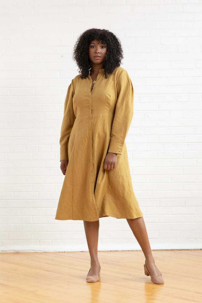 woman wearing yellow Brom dress