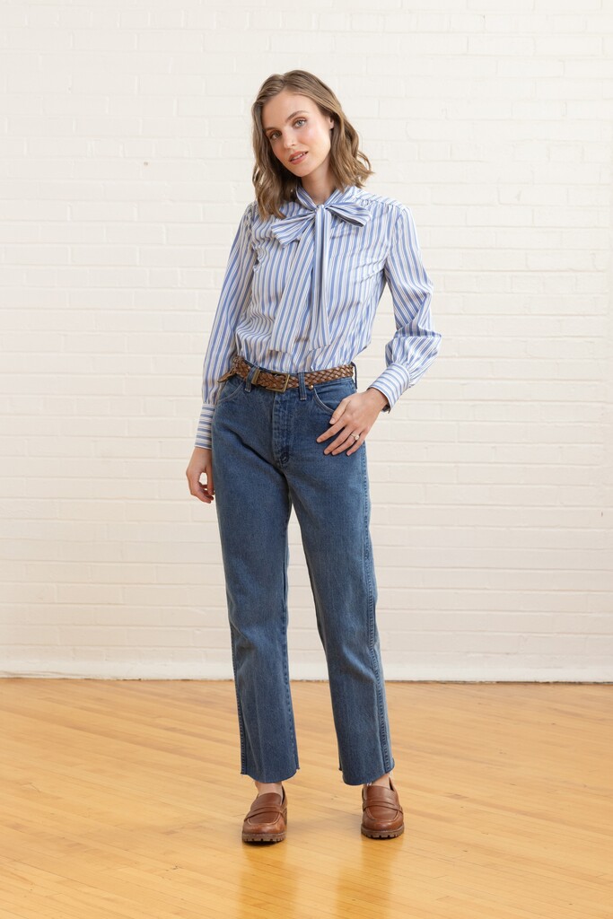 Woman wearing striped Garnet blouse