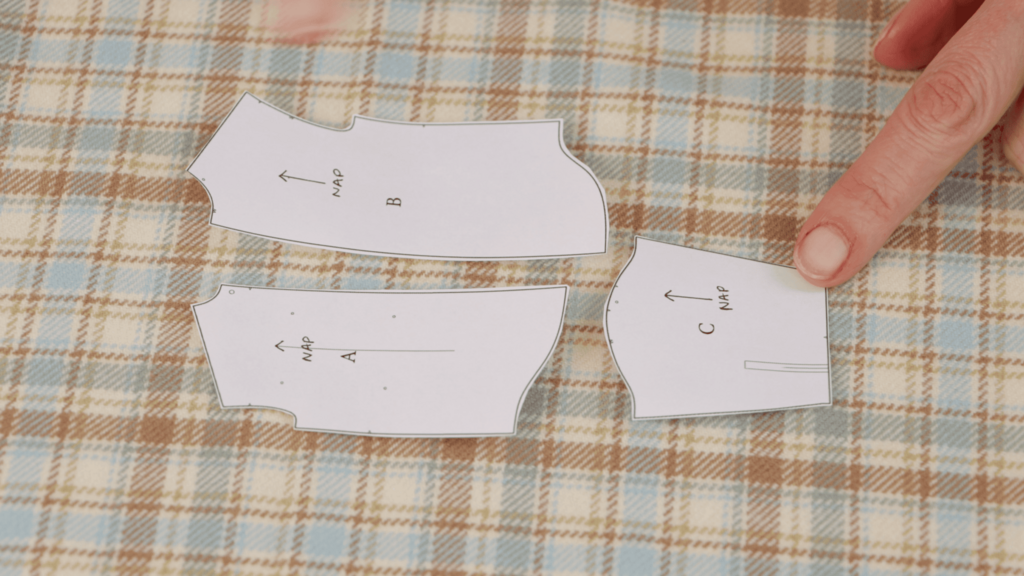 Hand demonstrating running along flannel's nap in both directions